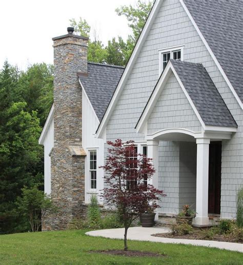 houses with grey metal roofs|gray homes with black roofs.